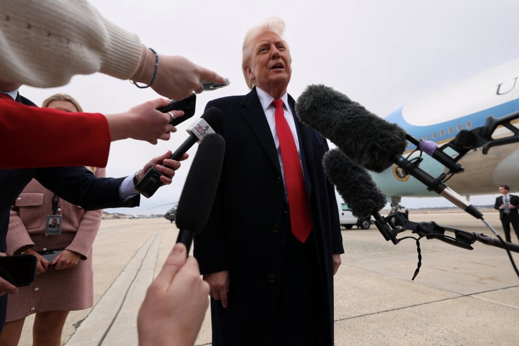 US President Donald Trump speaks to reporters before boarding Air Force One on Friday. Photo: Reuters