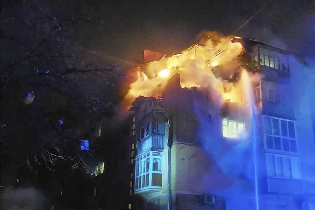 Firefighters put out a fire at an apartment building following a Russian drone attack in Chernihiv, Ukraine, on Sunday. Photo: Ukrainian Emergency Service via AP