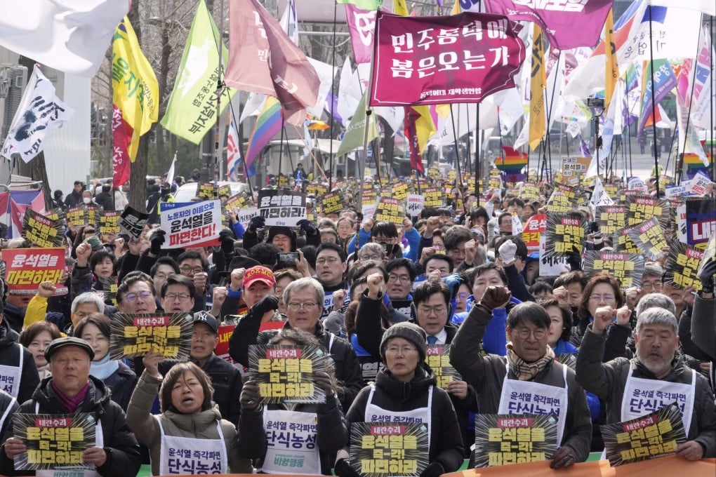 Protesters stage a rally in Seoul calling for impeached South Korean president Yoon Suk-yeol to step down on Monday. Photo: AP