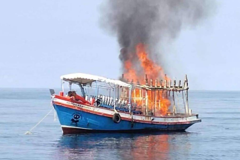 The Davy Jones Locker dive boat is seen ablaze off the coast of Koh Tao, Thailand, on Sunday. Photo: Facebook/ThailandRescueDiver2