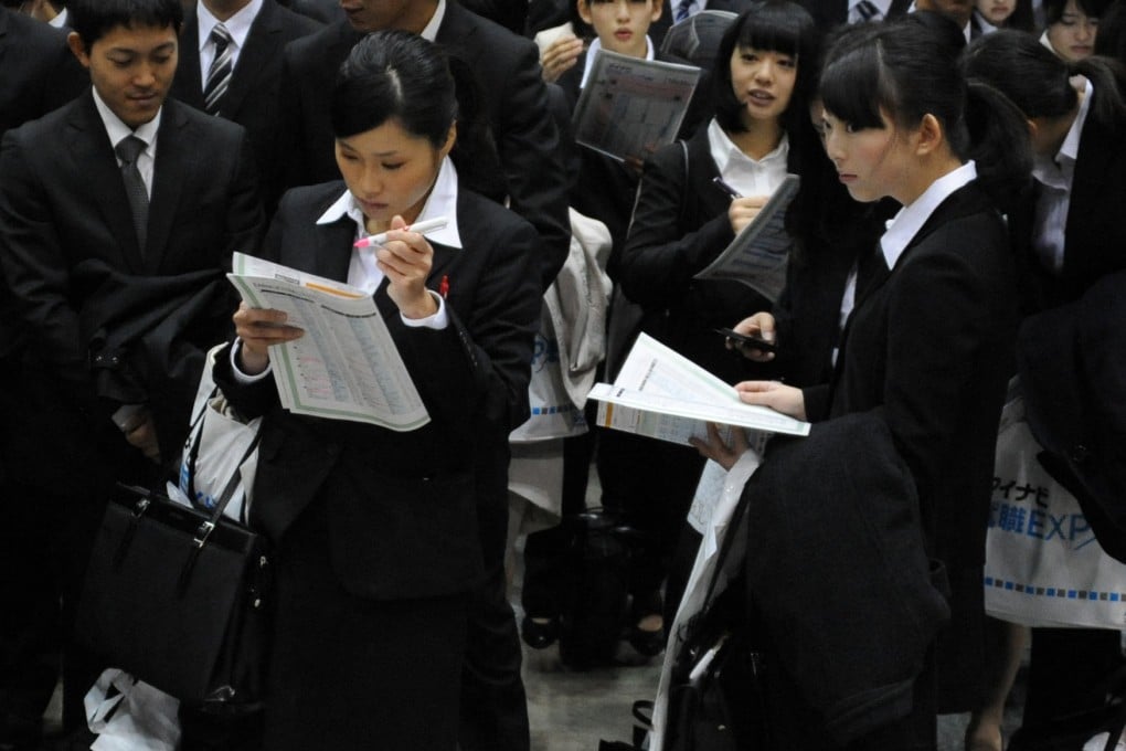 Japanese university students take part in a job recruitment event in Tokyo. Photo: AFP