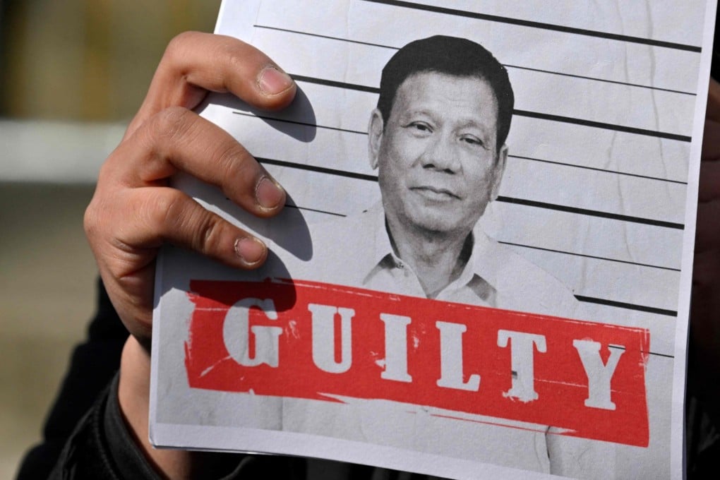 Protesters rally in support of the detention of former Philippine president Rodrigo Duterte outside of the International Criminal Court in The Hague. Photo: AFP