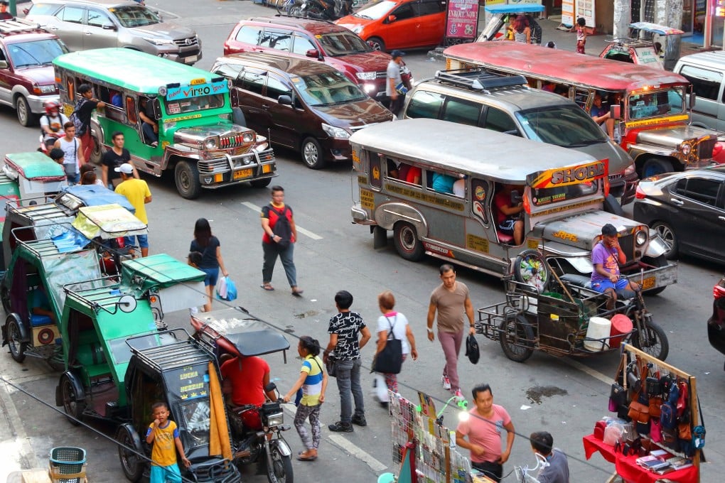 Manila’s ubiquitous jeepneys, the painting of which can be seen at the Sarao Motors factory in Las Piñas, southern Manila. Photo: Shutterstock