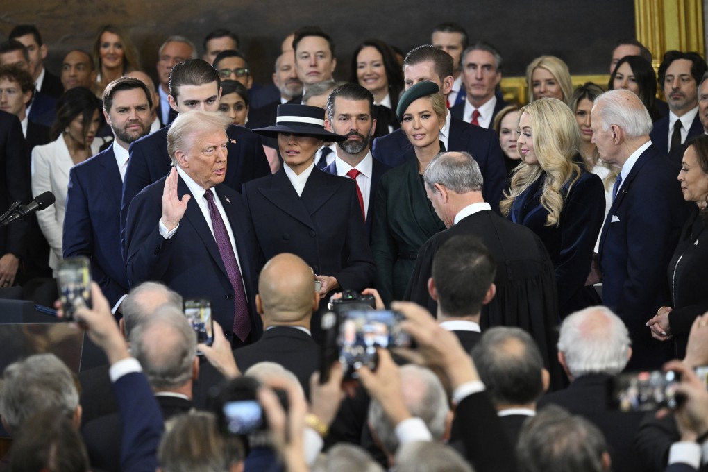 Donald Trump takes the oath of office during the presidential inauguration in the Capitol Rotunda in Washington on January 20. Photo: AP