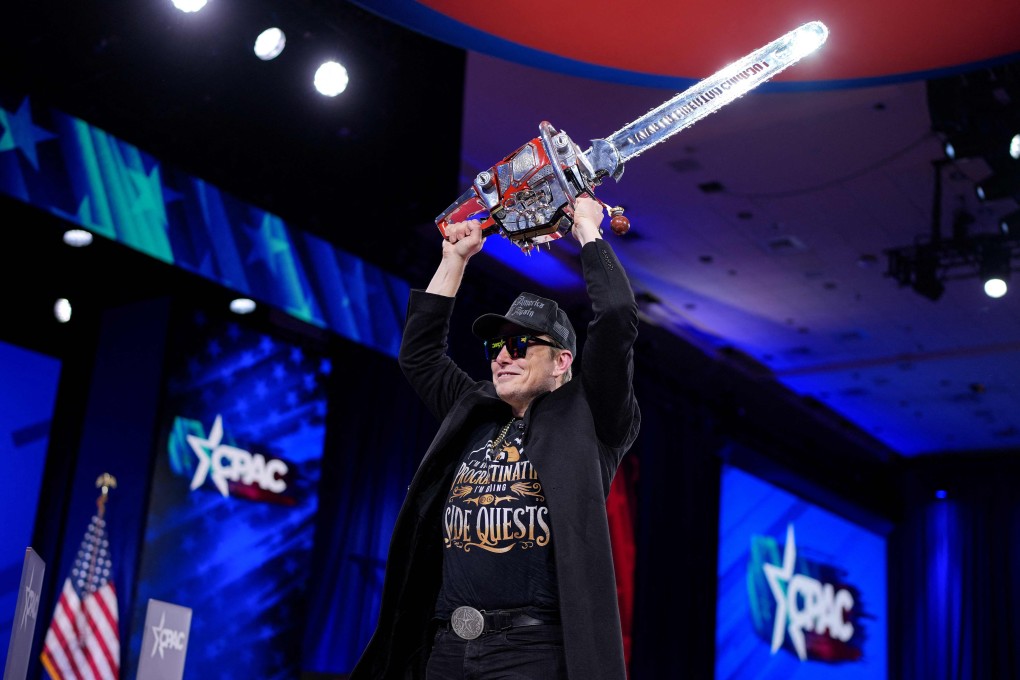 Elon Musk wields a chainsaw on stage at the Conservative Political Action Conference at the Gaylord National Resort Hotel And Convention Centre on February 20 in Oxon Hill, Maryland, US. Photo: Getty Images via AFP