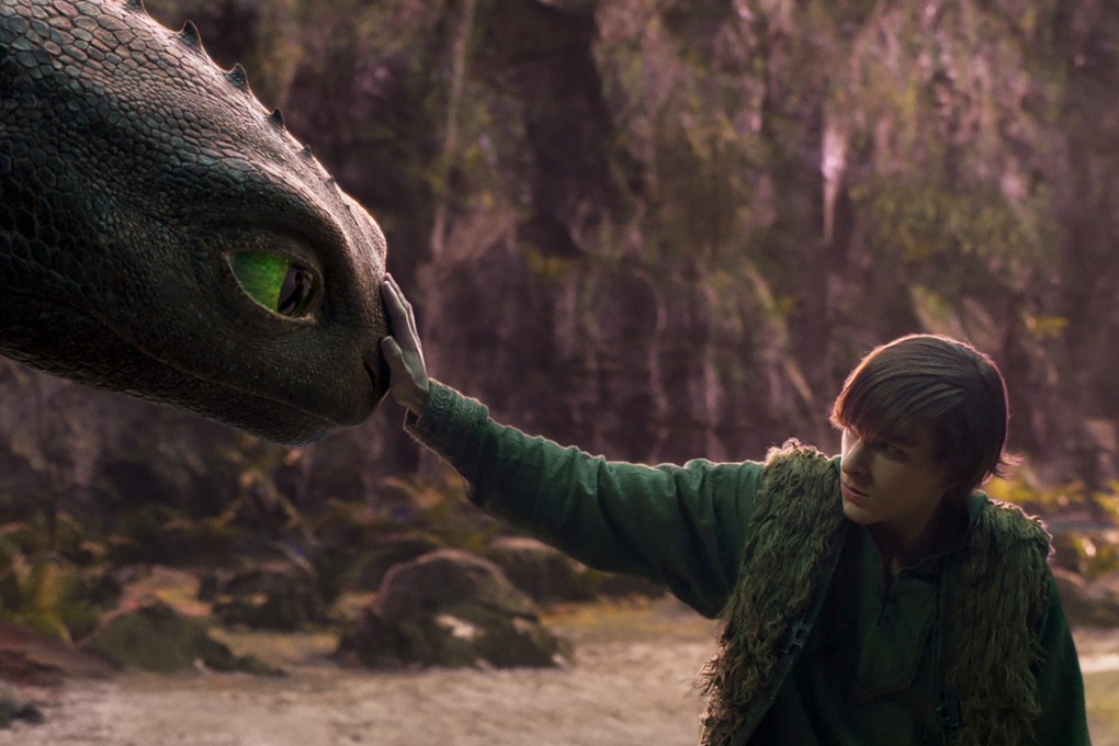 Mason Thamesas Hiccup with his Night Fury dragon, Toothless, in a still from the live-action animation remake How to Train Your Dragon, one of our Hollywood movies to watch in spring 2025. Photo: Universal Pictures