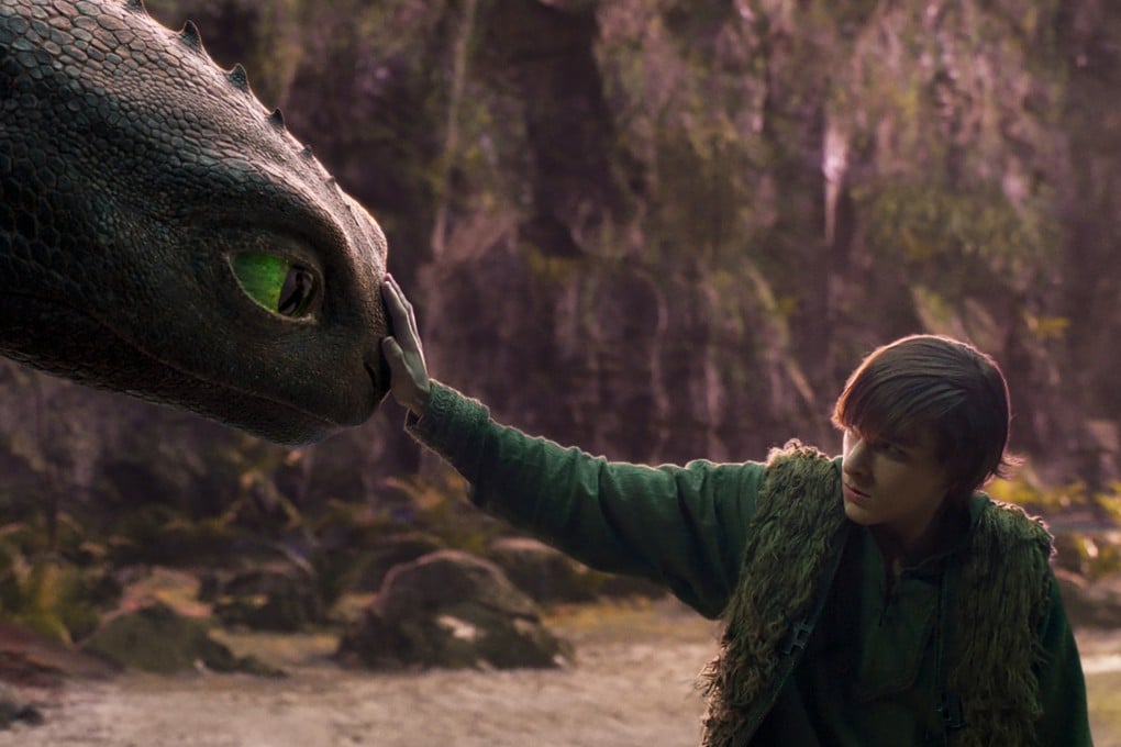 Mason Thamesas Hiccup with his Night Fury dragon, Toothless, in a still from the live-action animation remake How to Train Your Dragon, one of our Hollywood movies to watch in spring 2025. Photo: Universal Pictures