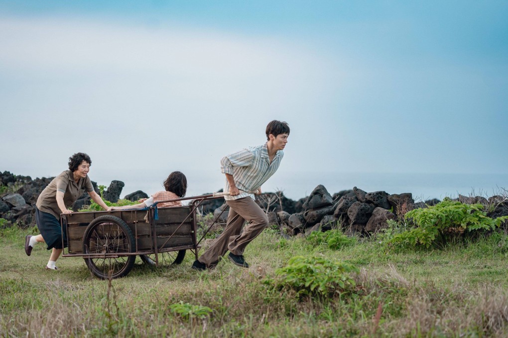 (From left) Oh Min-ae, IU and Park Bo-gum in a still from When Life Gives You Tangerines. With the number of Korean visitors to Jeju on the decline, the island is looking to TV shows like this one to draw them back and lure overseas visitors. Photo: Netflix