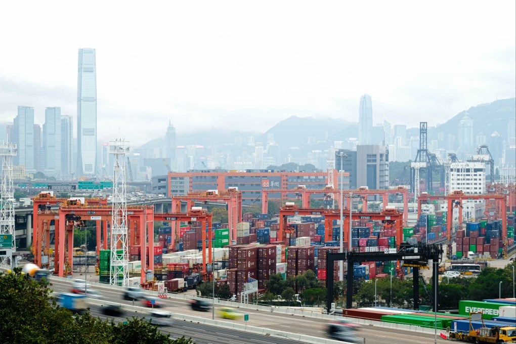 Cargo containers sit against the Hong Kong skyline on March 4. US President Donald Trump imposed additional tariffs on imports from China, including Hong Kong, citing the fentanyl crisis. Photo: dpa