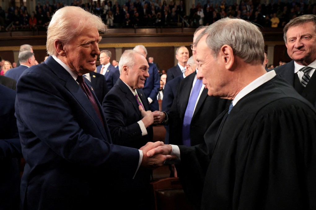 US President Donald Trump and Chief Justice John Roberts at the US Capitol in Washington on March 4. Photo: Pool via Reuters