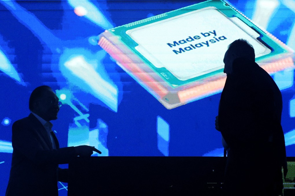 Malaysia’s Prime Minister Anwar Ibrahim (left) speaks to Rene Haas, CEO of Arm Holdings, at an event in Kuala Lumpur on March 5. Photo: Reuters