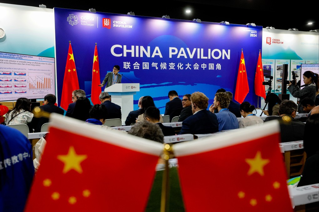Visitors listen to a lecture at the China pavilion at the UN’s COP29 climate change conference in Baku, Azerbaijan, in November. Photo: EPA-EFE