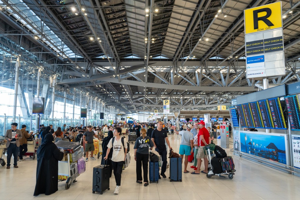 Travellers at the departure hall of Suvarnabhumi Airport in Bangkok. Photo: Harvey Kong