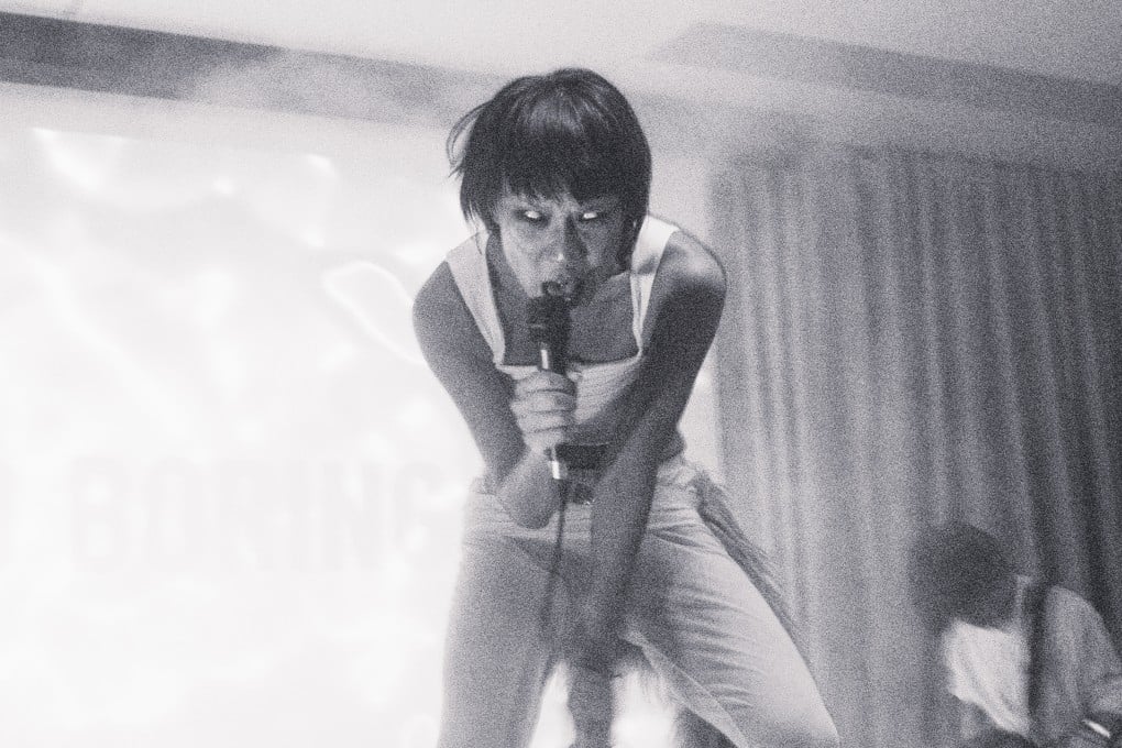 Janice Lau of David Boring performs at Current Plans in Wong Chuk Hang, Hong Kong, on March 15, 2025. The one-off show, titled “Stare Out From Your Own Burning”, included the band live-scoring horror music videos by local filmmakers with new songs. Photo: Elton Fung