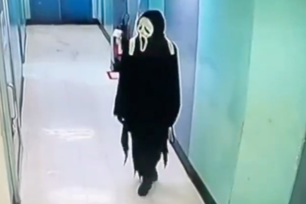 A man in Chiang Mai dressed as ‘Ghostface’ is arrested after he fails to rob a gold shop. Photo: Handout