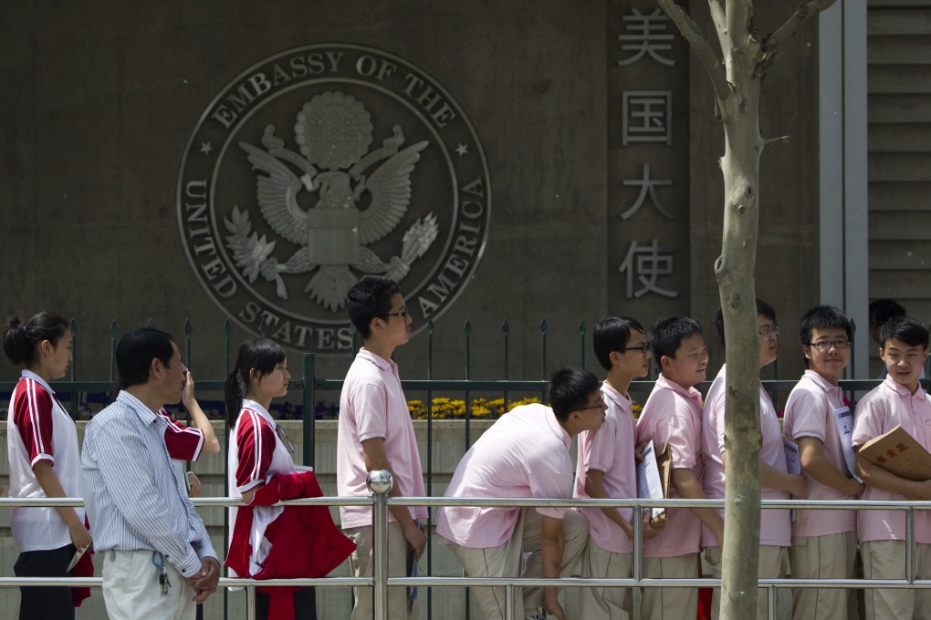 Chinese students wait outside the US embassy in Beijing for visa application interviews. The Chinese government has urged the US to stop “generalising national security” amid growing scrutiny of Chinese nationals in the US. Photo: AP