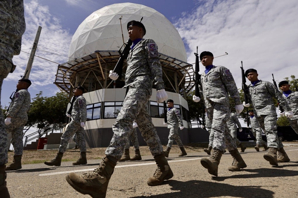 Filipino soldiers march at a military airbase in San Fernando city, in the Philippines, during a visit by Japanese defence minister Gen Nakatani on February 23. Photo: EPA-EFE