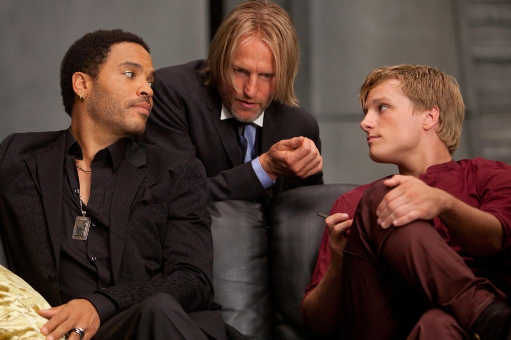 (From left) Lenny Kravitz, Woody Harrelson and Josh Hutcherson in The Hunger Games: Catching Fire. Harrison plays Haymitch Abernathy in the movies adapted from Suzanne Collins’ novels. Her latest explores Abernathy’s youth. Photo: Lionsgate
