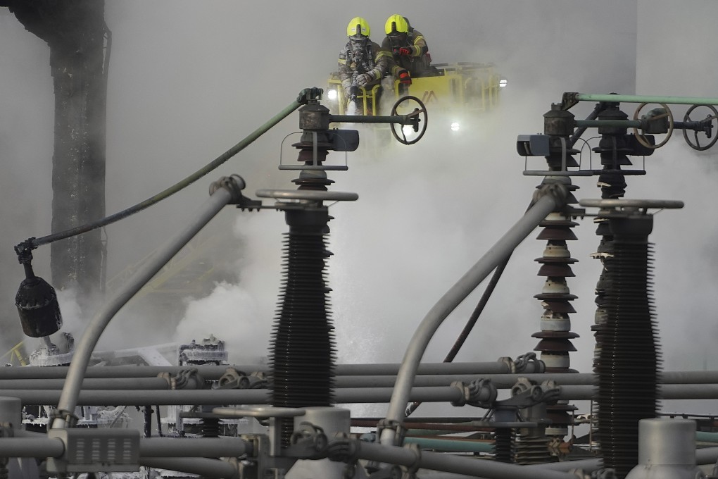 Firefighters battle the blaze near London’s Heathrow Airport. Photo: AP