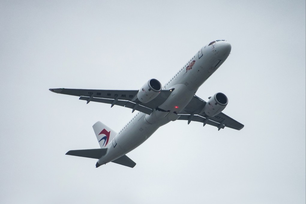 A China Eastern Airlines C919 takes off from Hong Kong International Airport on January 1 on the plane’s first scheduled commercial flight starting outside mainland China. Photo: Eugene Lee