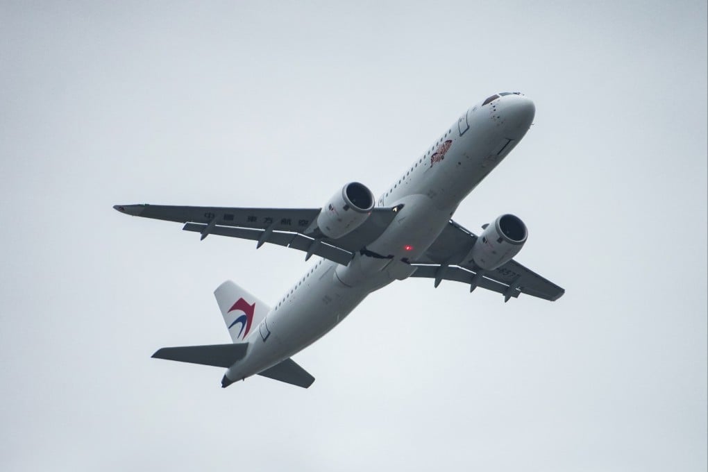 A China Eastern Airlines C919 takes off from Hong Kong International Airport on January 1 on the plane’s first scheduled commercial flight starting outside mainland China. Photo: Eugene Lee