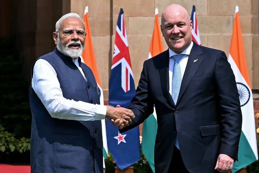 India’s Prime Minister Narendra Modi (left) shakes hands with his New Zealand counterpart Christopher Luxon in New Delhi on Monday. Photo: AFP