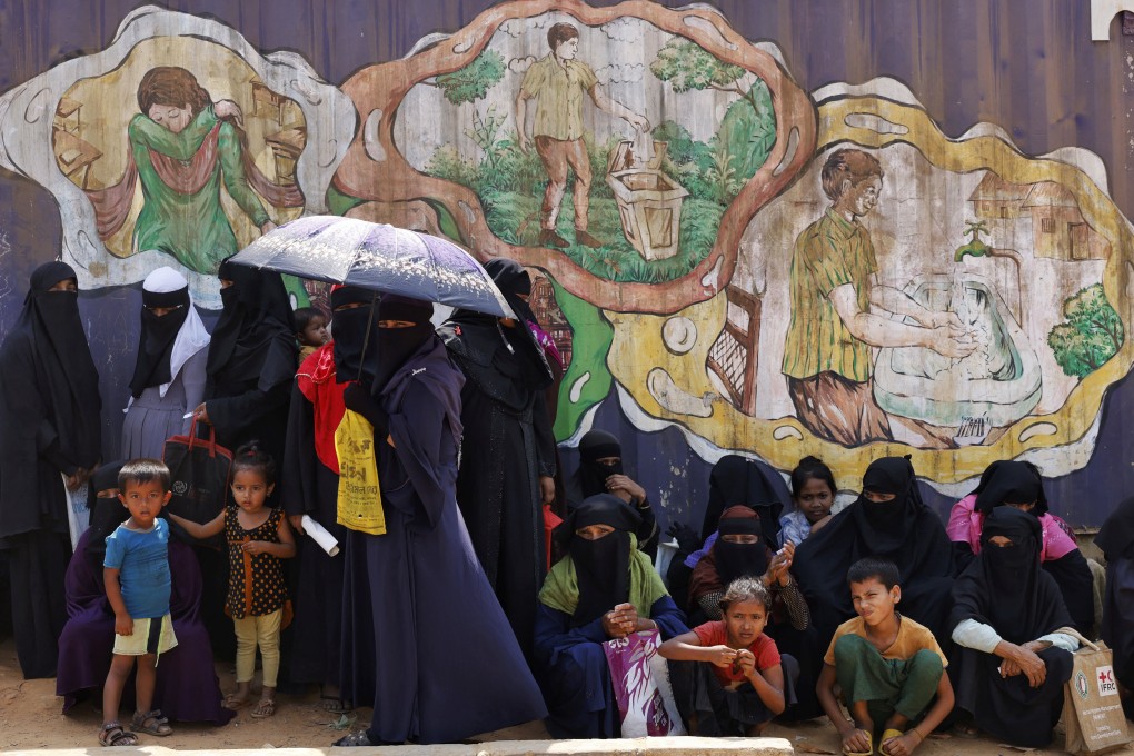 Rohingya refugees wait for relief supplies during Ramadan at the Rohingya refugee camp in Cox’s Bazar, Bangladesh on Sunday. Photo: Reuters