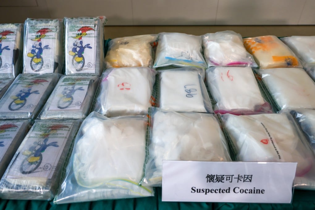 Officers on Friday found 39kg of suspected cocaine hidden inside two suitcases and a large nylon carrier bag. Photo: Dickson Lee