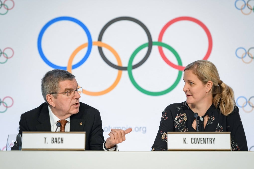 Kirsty Coventry, pictured with outgoing IOC president Thomas Bach, must tackle a number of sensitive issues. Photo: AFP
