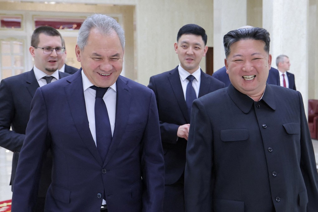 North Korean leader Kim Jong-un and Russia’s top security adviser Sergei Shoigu react during Shoigu’s visit to North Korea. Photo: KCNA/Reuters