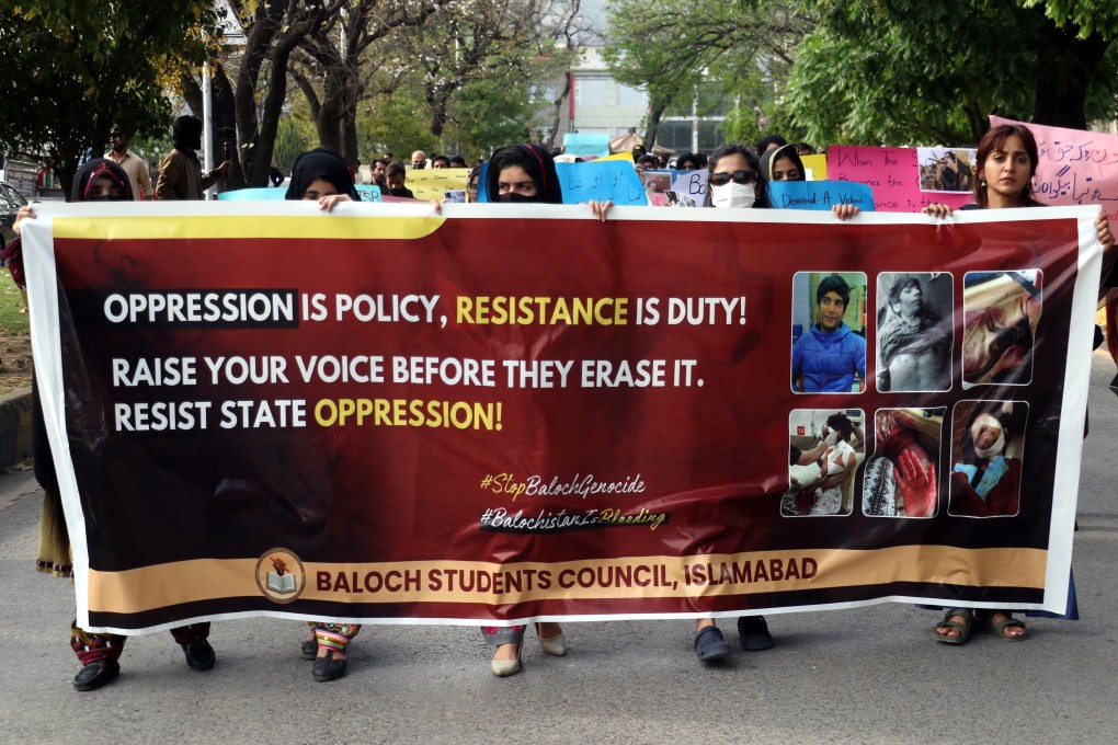 Supporters of the Baloch hold placards as they rally to protest after their leader Mahrang Baloch was arrested in Quetta, in Islamabad on Saturday. Photo: EPA-EFE