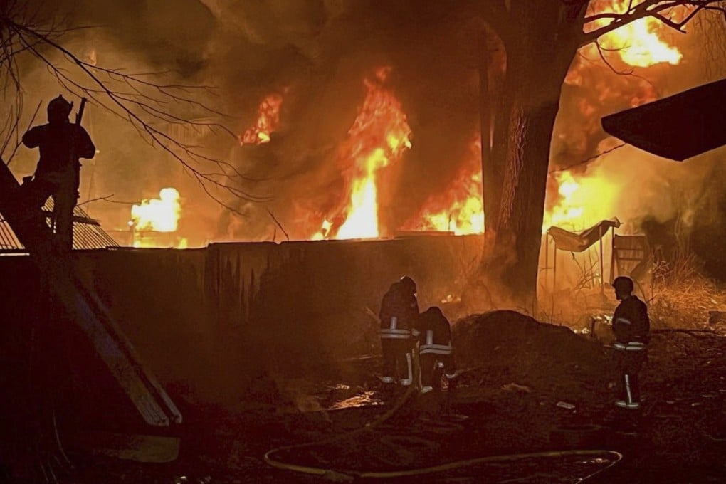 Firefighters put out a blaze following a Russian attack near Kyiv on Sunday. Photo: Ukrainian Emergency Service via AP