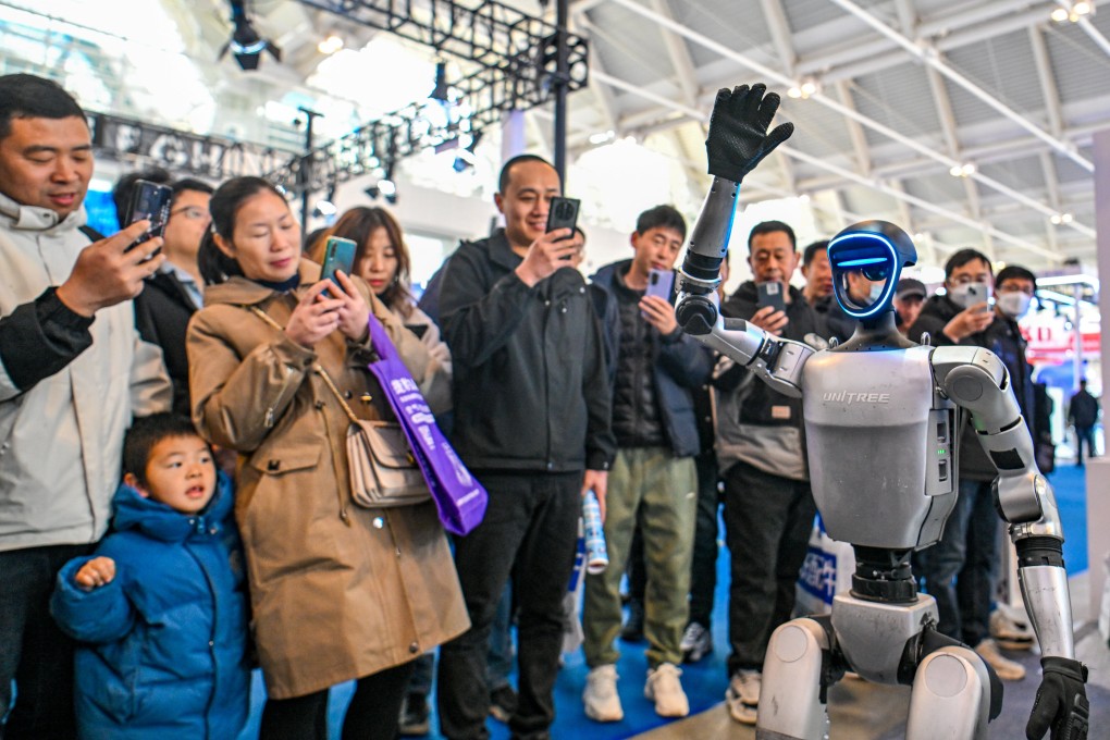 A robot performs during a trade show in Tianjin, China on March 6. Beijing has pledged to raise funding for artificial intelligence as part of an action plan to boost consumption. Photo: Xinhua