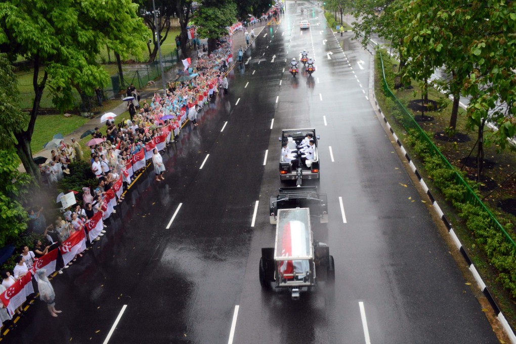 The body of Singapore’s former prime minister Lee Kuan Yew is transferred atop a gun carriage during a funeral procession in 2015. Photo: AFP