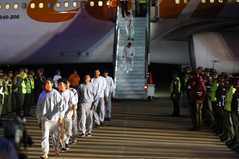Venezuelan migrants deported from the US deplane at the Simon Bolivar International Airport in Maiquetia, Venezuela, in February. Photo: AP