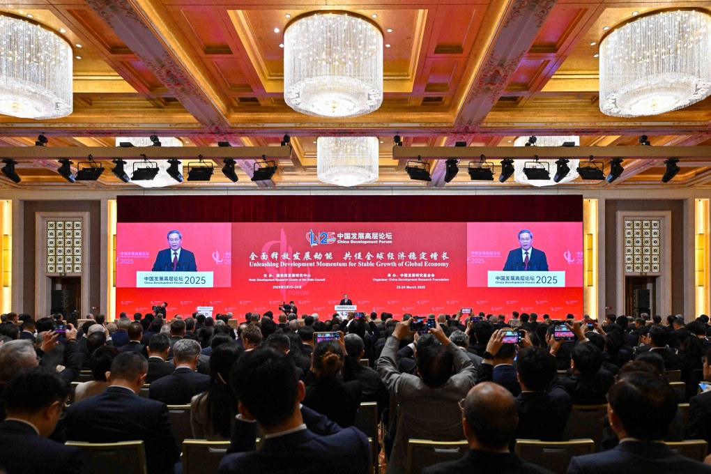Chinese Premier Li Qiang speaks during the opening ceremony of the China Development Forum, in Beijing on March 23. The two-day annual forum has brought together more than 80 top executives of global multinationals for exchanges with Chinese officials. Photo: AFP