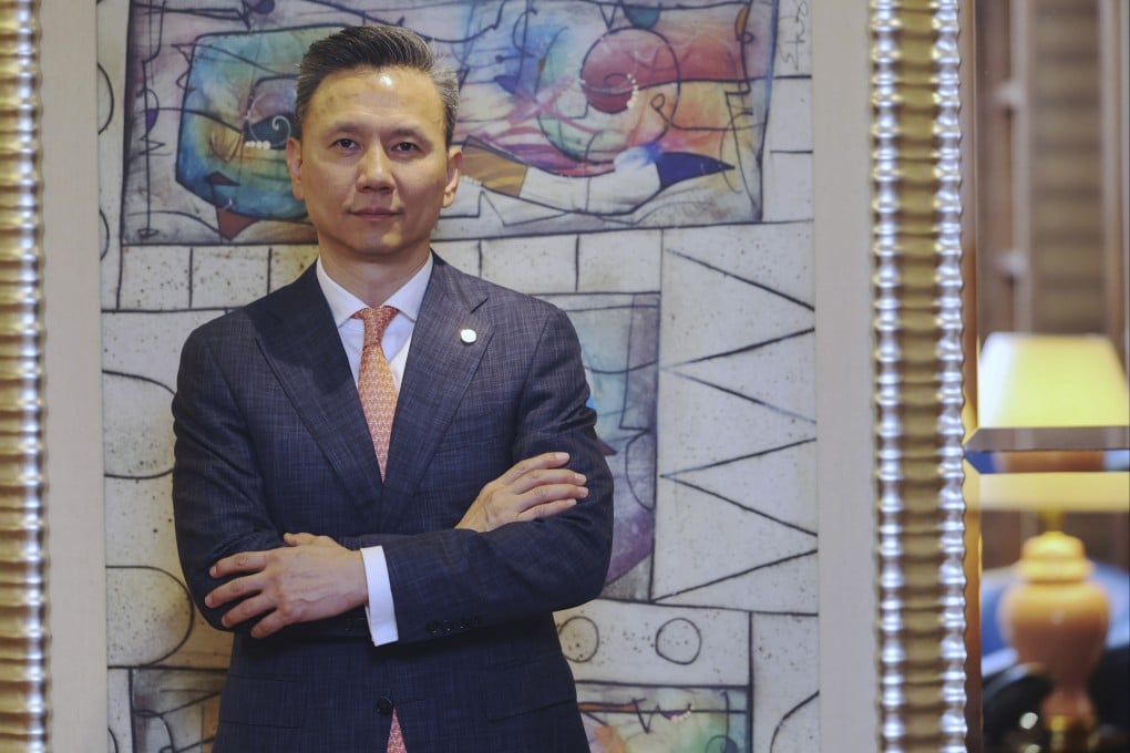 Co-CEO Michael Guo is looking to add the missing piece to its insurance business in Hong Kong. Photo: Edmond So