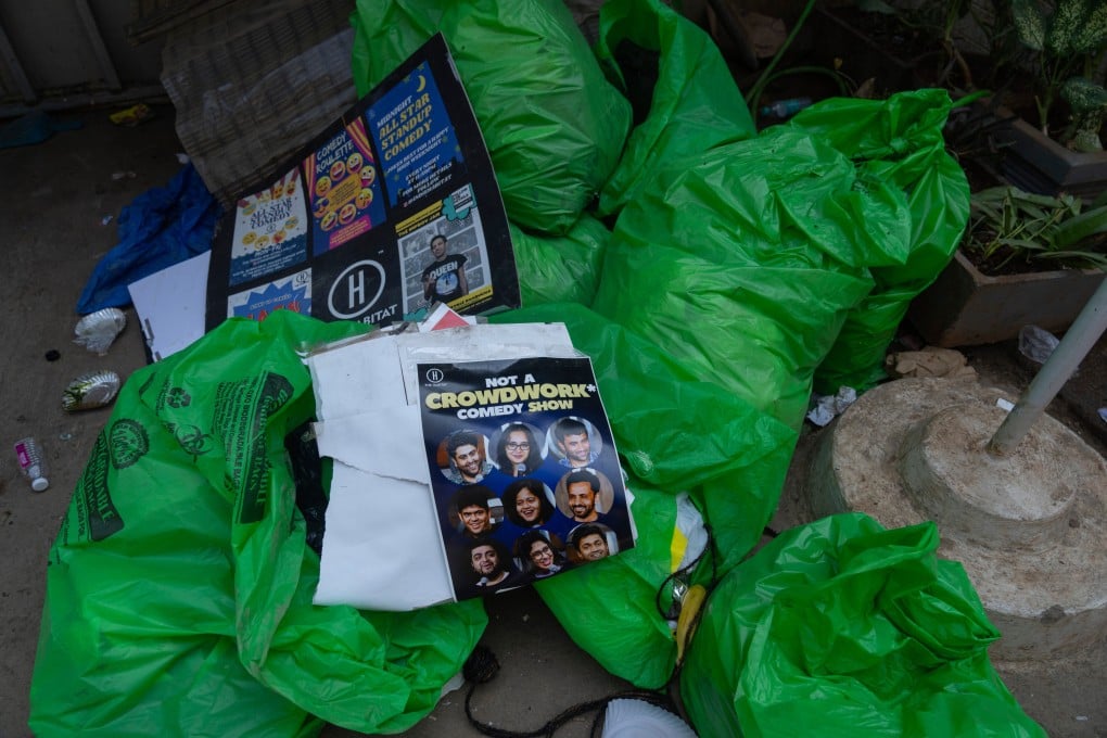 Posters are seen scattered outside the studio where Indian comedian Kunal Kamra allegedly made “defamatory” remarks against Shiv Sena politician Eknath Shinde, in Mumbai, India onMonday, March 24. Photo: AP