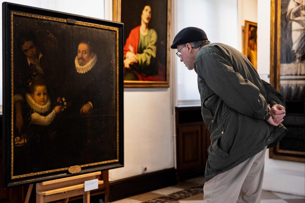 Portrait of a Gentleman, his Daughter and a Servant at the Musee de la Chartreuse in Douai, France. Long thought to have been the work of a Flemish male painter, it has now been attributed to one of the leading woman painters of the Italian Renaissance. Photo: AFP