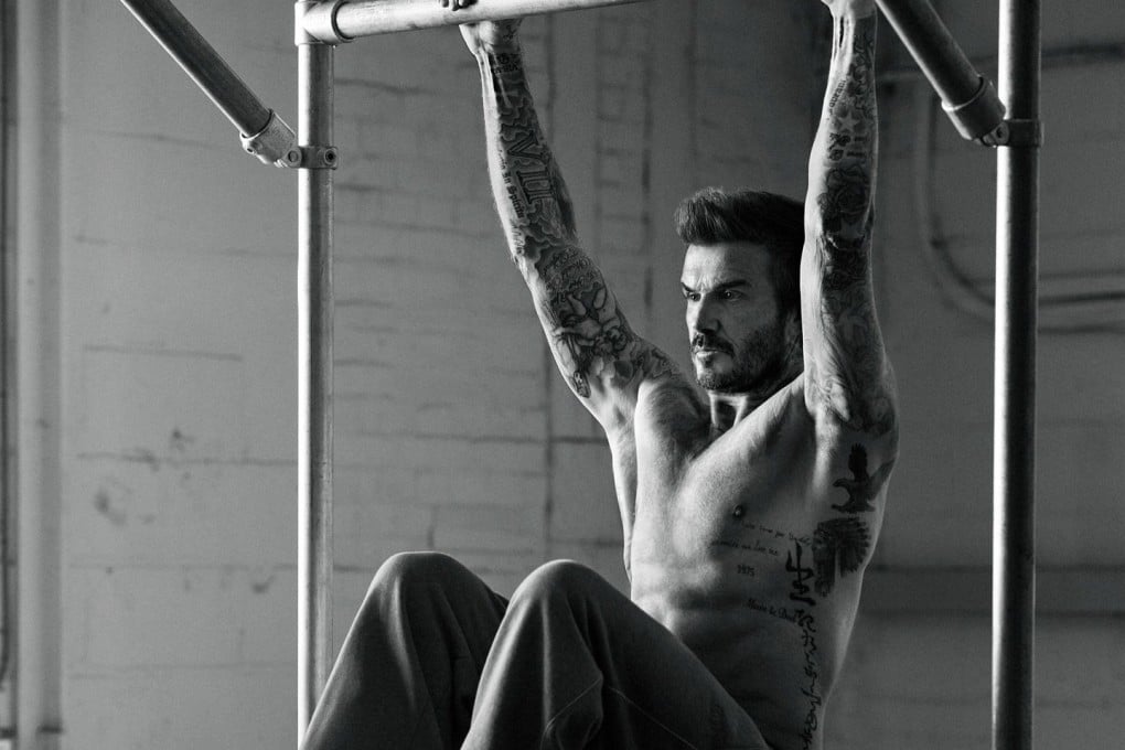 Ex-football star David Beckham does a pull-up as part of his gym routine. “As long as I’m fit and healthy and my family is healthy, that’s all I care about,” says David Beckham of turning 50 in May. Photo: Instagram/davidbeckham