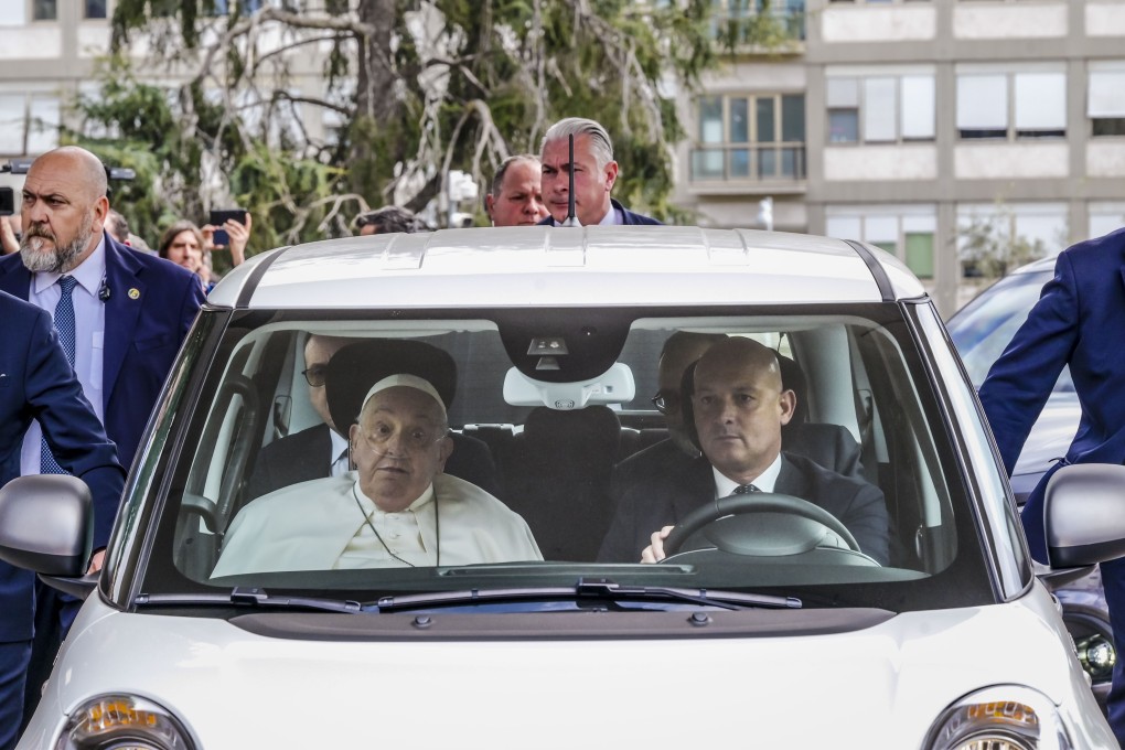 Pope Francis leaves the Agostino Gemelli Polyclinic in Rome, Italy on his way back to the Vatican on Sunday. Photo: AP