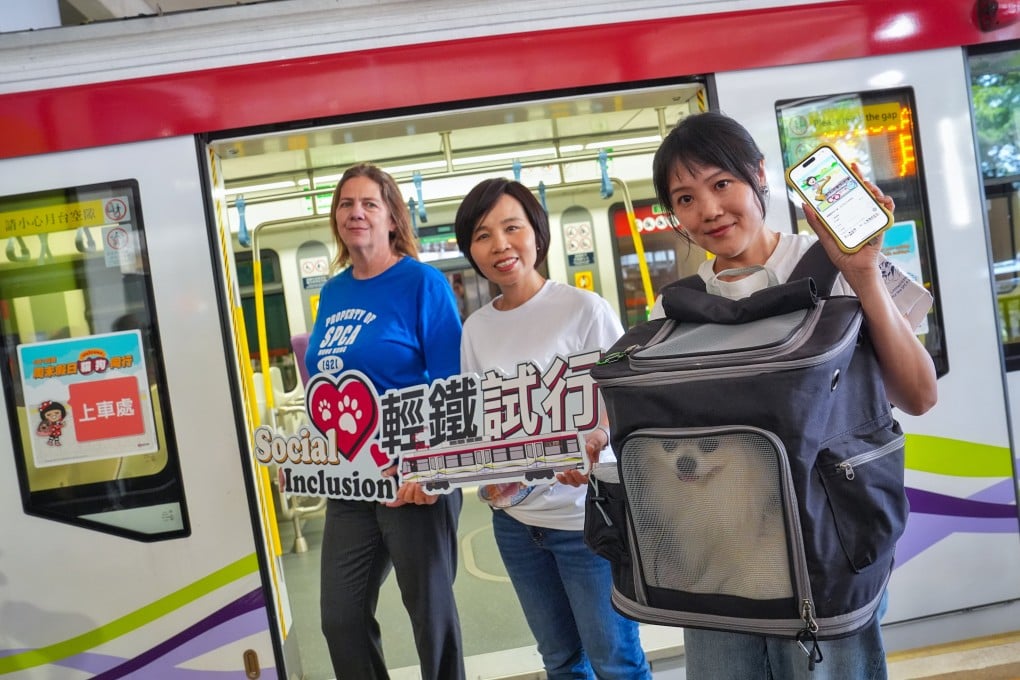 (From left) SPCA Hong Kong deputy director of welfare Fiona Woodhouse, the MTR Corp’s Cheris Lee and pet owner Natalie Cheng at a press event on the rail giant’s trial run to allow pets on light rail trains. Photo: Elson Li