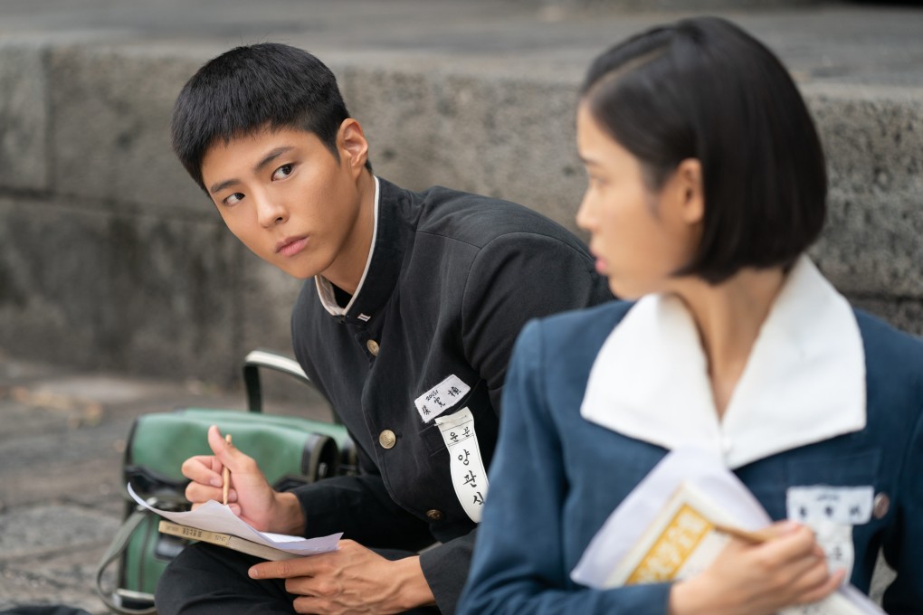 Park Bo-gum as Yang Gwan-sik, husband to Ae-sun, played by IU (right), in Netflix Korean drama series When Life Gives You Tangerines.