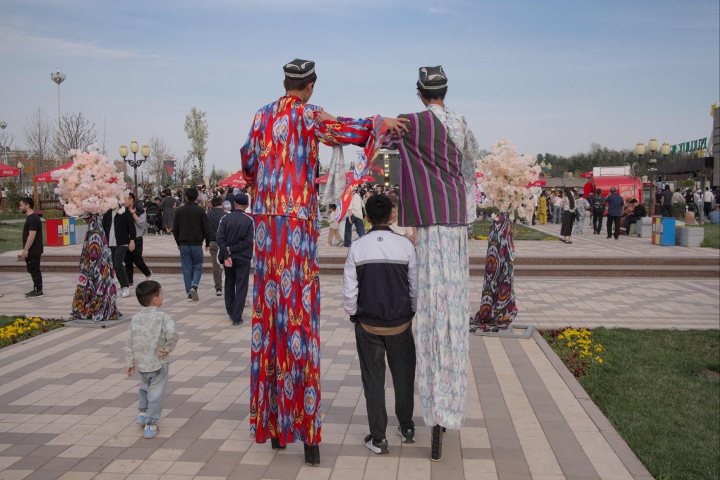 People celebrate Nowruz at a theme park in Tashkent, Uzbekistan. Photo: AFP
