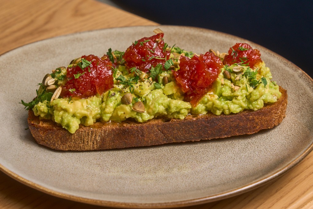 Smashed avocado on sourdough toast with chilli jam from Servo, a new Australian-style cafe in Hong Kong. Photo: Servo