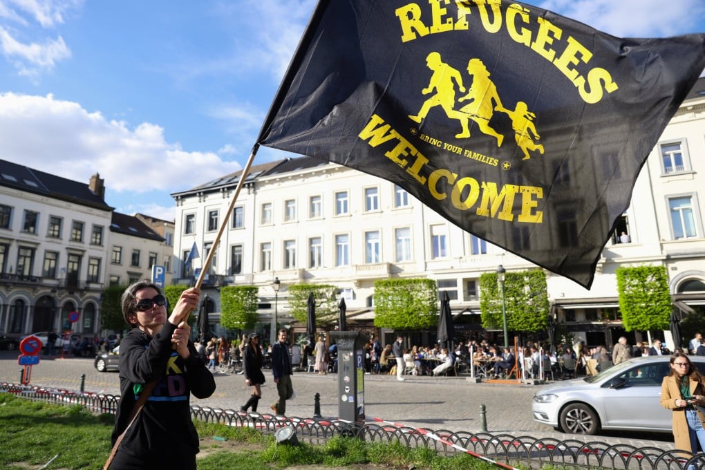 Activists protest outside the European Parliament Belgium in 2024. Several EU countries are mulling stopping or tightening the right for people, who cannot safely return to their home countries, to bring their families, but so far no bloc member has a complete halt in place. Photo: Reuters