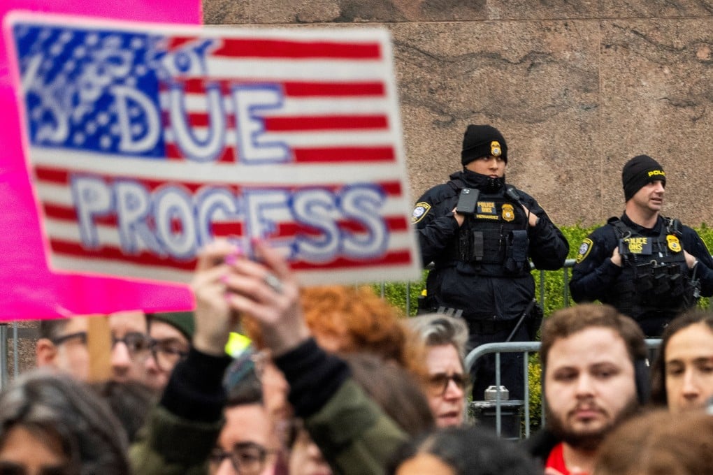 Law enforcement officers stand guard as protesters take part in a rally organised by Jewish activists against the detention of Columbia University graduate student Mahmoud Khalil in New York on March 20. Photo: Reuters