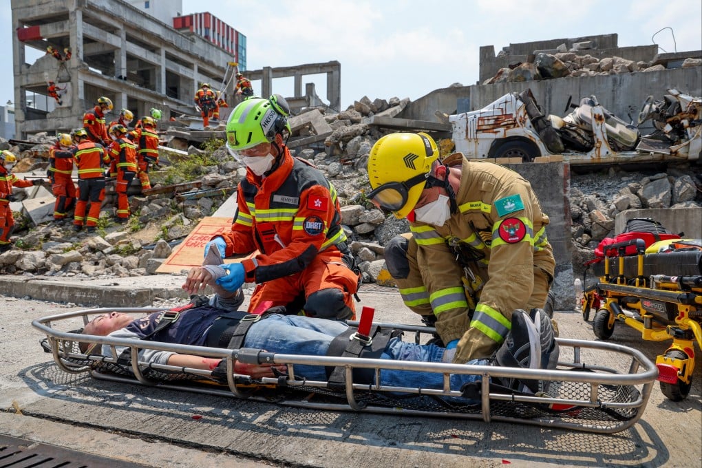 A simulated emergency operation at a collapsed building, held as part of the Hong Kong-led joint exercise with Macau and Guangdong fire and rescue services. Photo: Dickson Lee