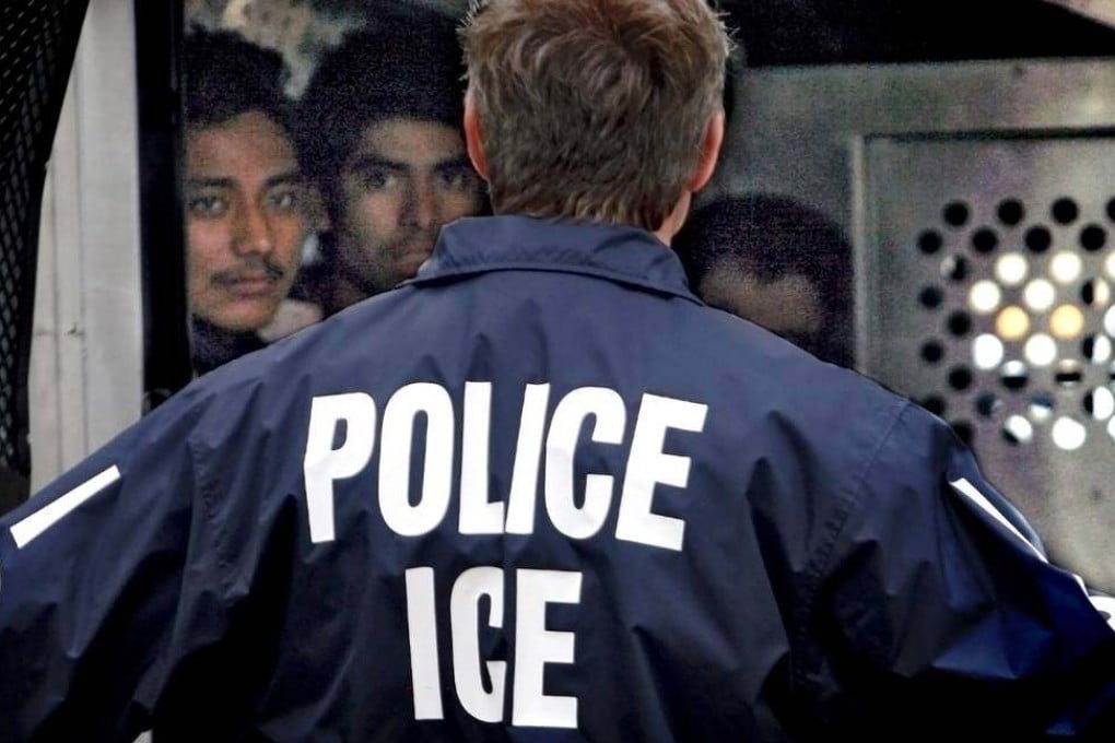 A US Immigration and Customs Enforcement officer talks to a group of undocumented immigrants detained in Kansas. Photo: TNS