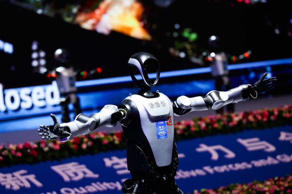 Humanoid robots perform at the Zhongguancun Forum in Beijing on Thursday. Photo: EPA-EFE